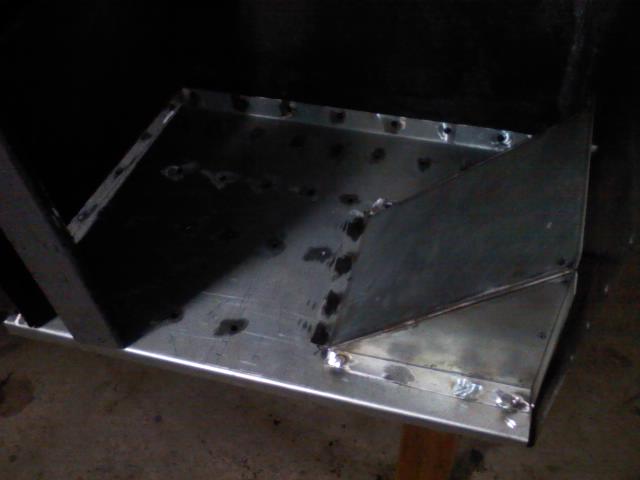 I removed the rear panel to make it easier to replace the floor.